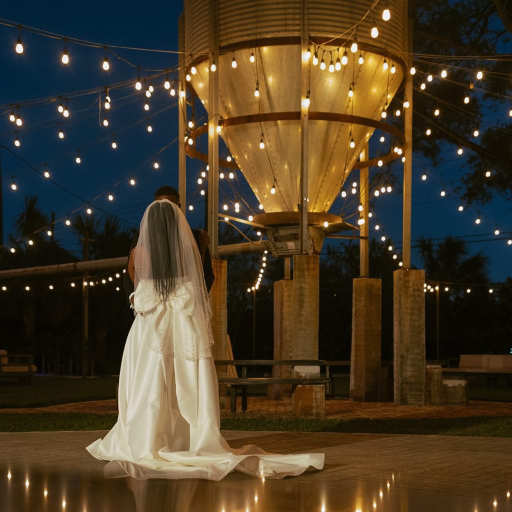 Romantic bride at Tabellas in Riverview, FL, captured in moody low lighting. A timeless moment from a dreamy Valentine’s-themed wedding.