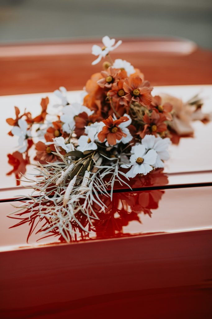 Romantic bridal bouquet featuring fresh roses, peonies, and eucalyptus, perfect for a timeless wedding aesthetic. Elegant floral arrangement for modern brides.