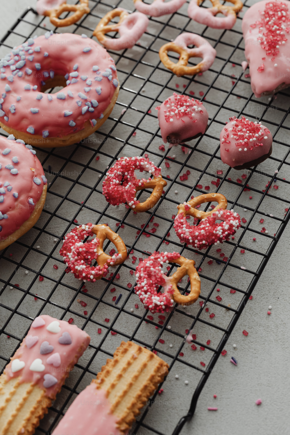 Delicious pink chocolate-dipped snacks elegantly displayed for a Valentine’s-themed wedding in Riverview, FL. A sweet and festive treat adding a touch of romance to the wedding dessert table.